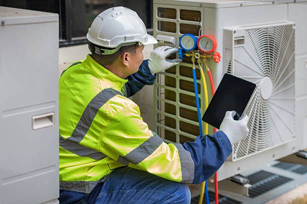 Professional Hvac technician working in Birmingham, MI